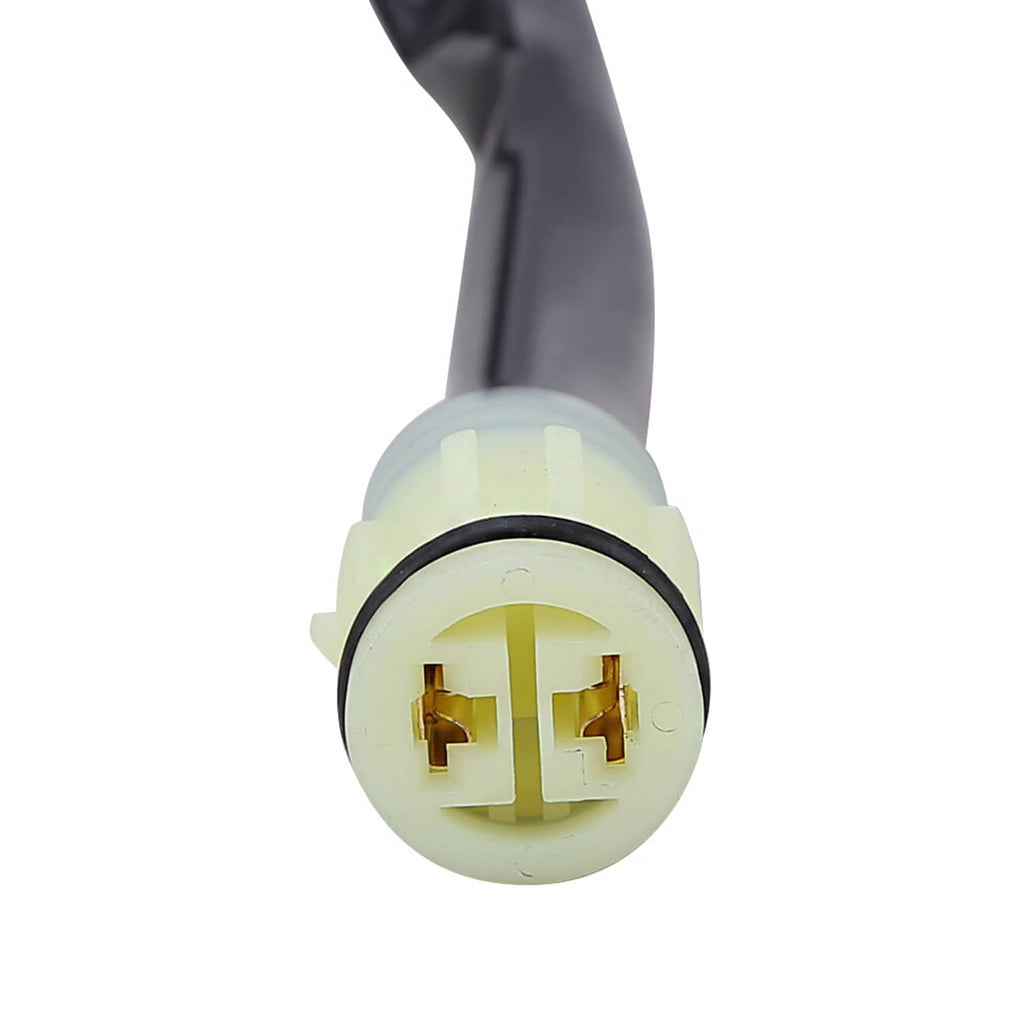Electrical connector plug on black wire, with pale yellow housing and gold contacts
