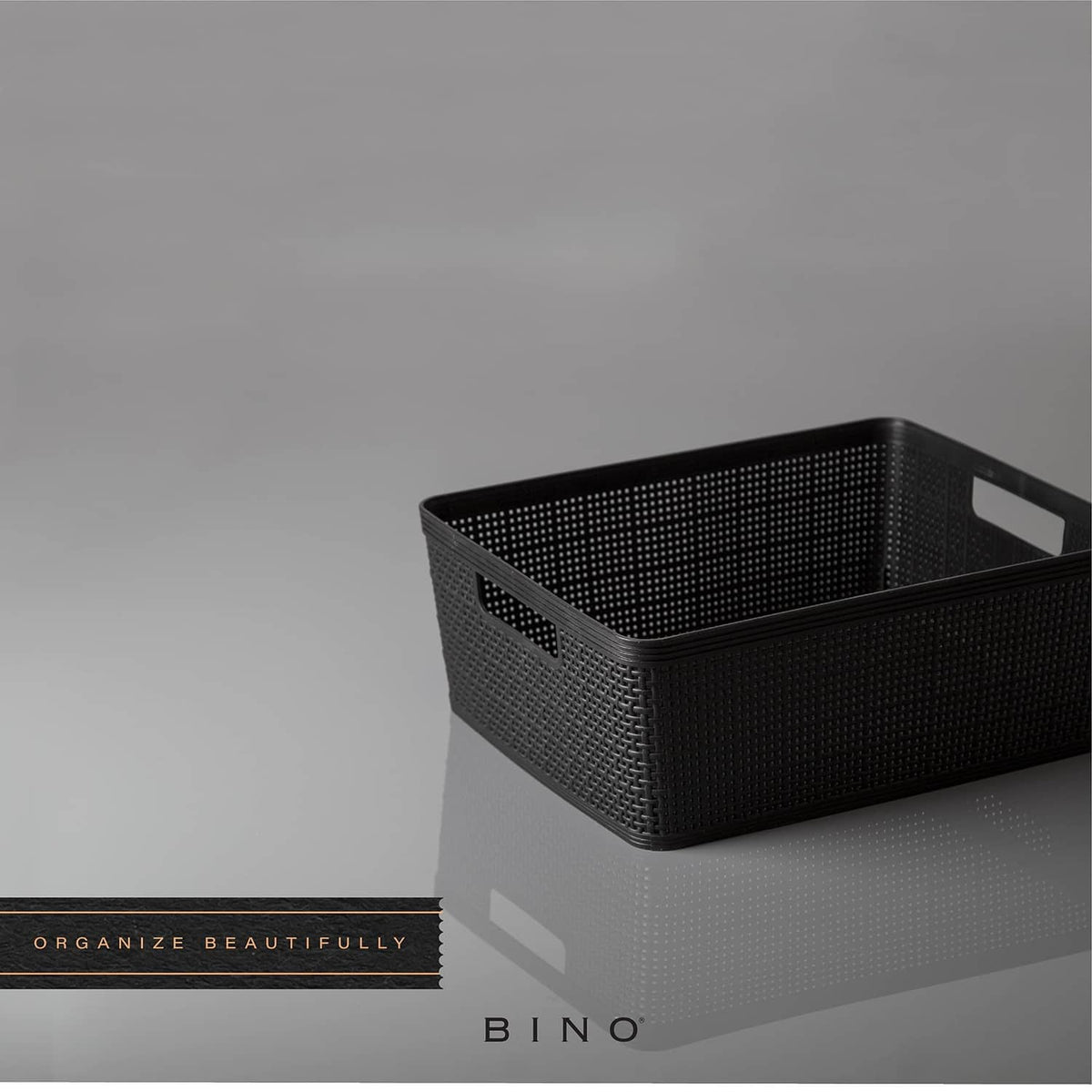 Medium black woven plastic storage bin with side cutout handle