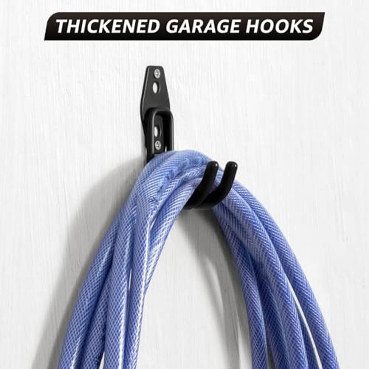 Black garage hook mounted on wall, hanging a loop of blue braided hose