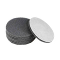 5-inch 1000-grit round scouring pads, dark and white