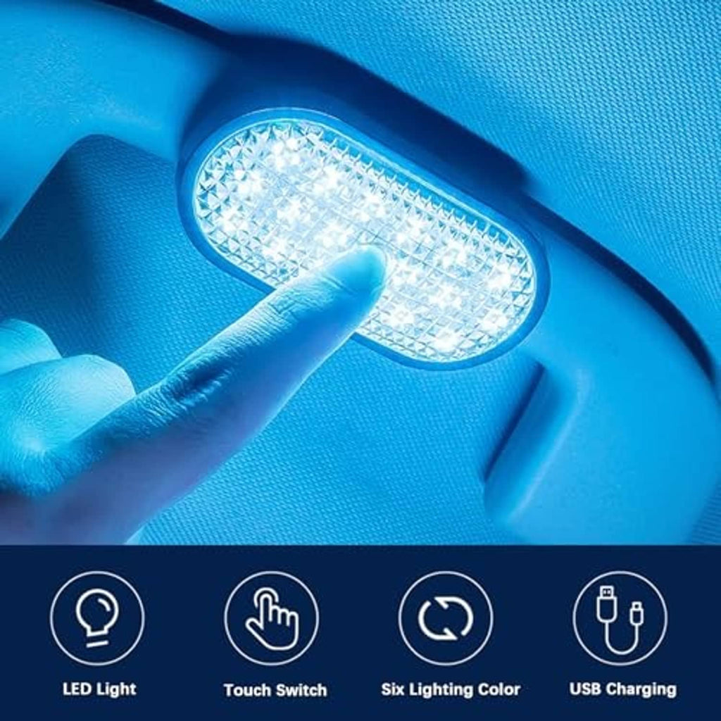 Wireless LED dome light showing blue illumination in car cabin