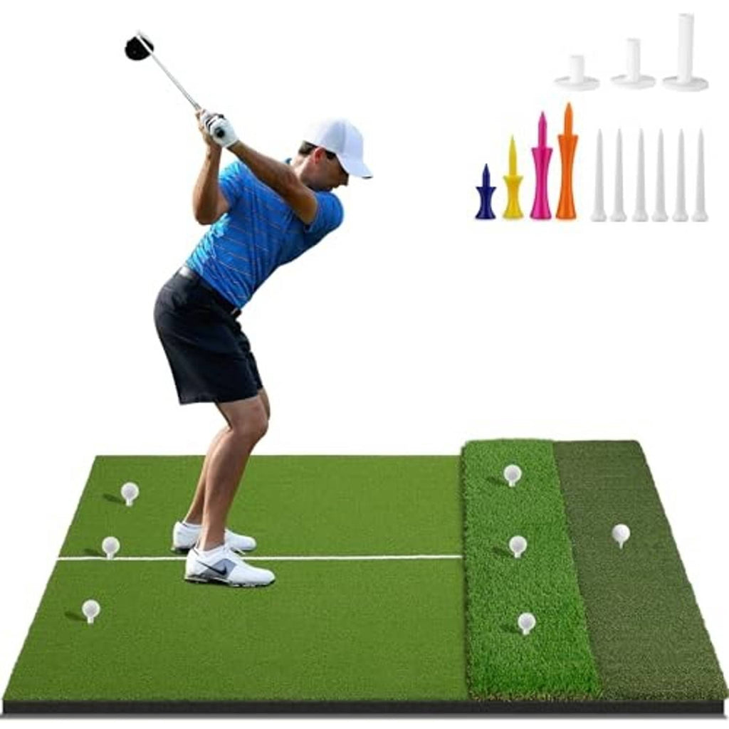 Green golf hitting mat with golf tees and markers, golfer mid-swing over the turf