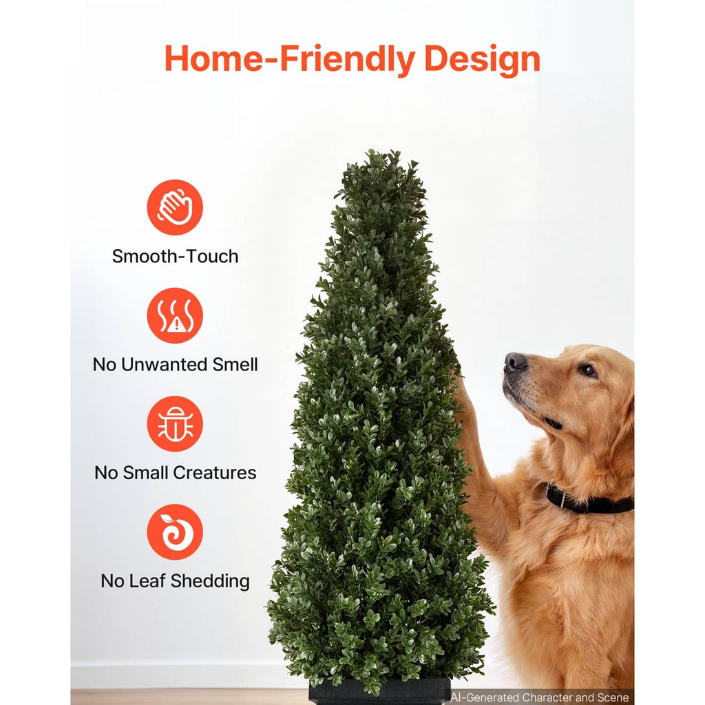 Artificial boxwood topiary, dark green cone tree in black pot next to dog