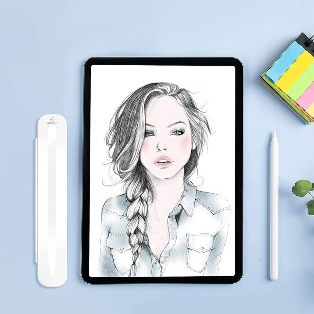 Compact white and teal stylus case with protective cover beside a tablet
