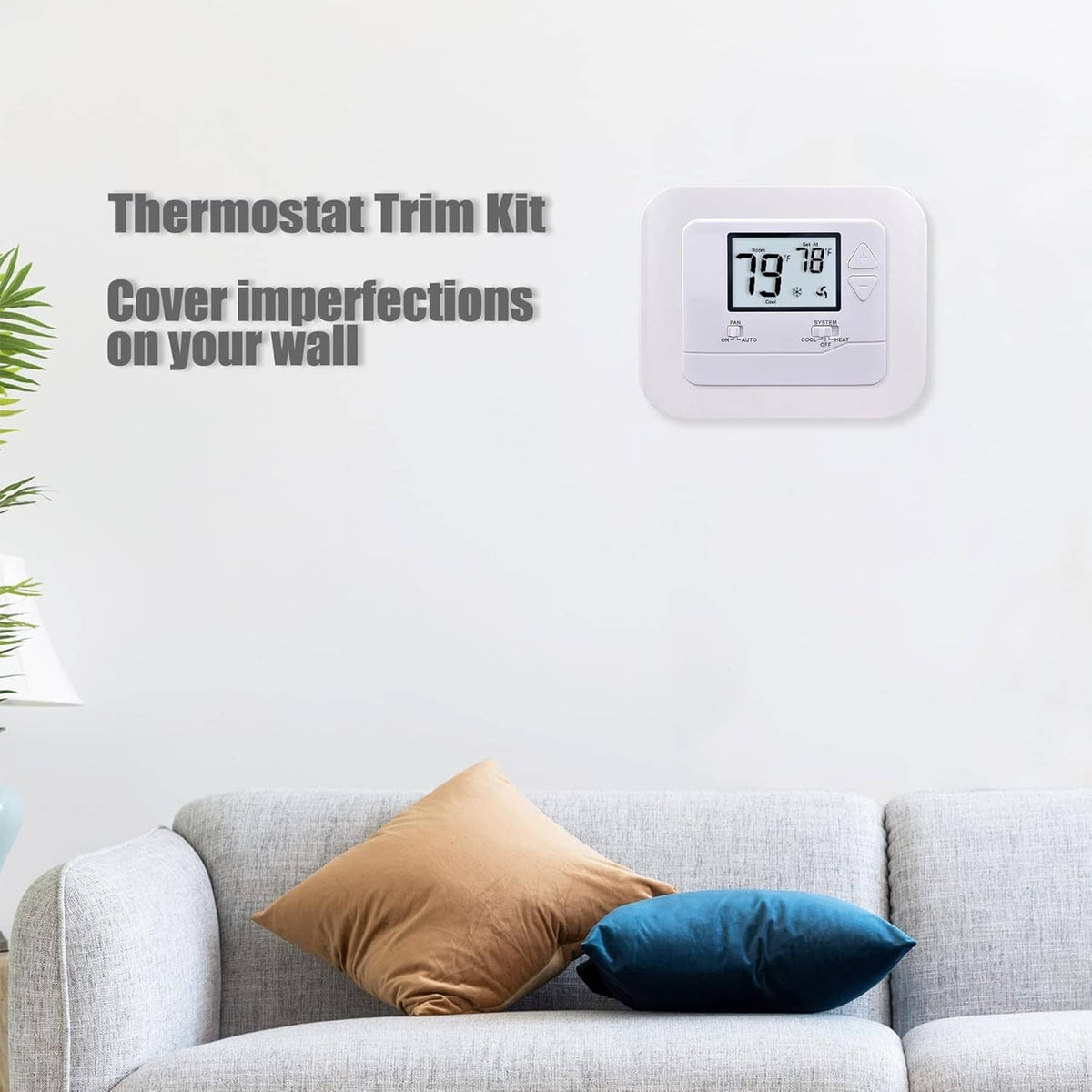 Off-white thermostat wall plate cover trim kit installed on a wall