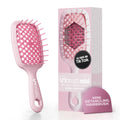 Light pink mini detangler brush with square cushion and pink bristles