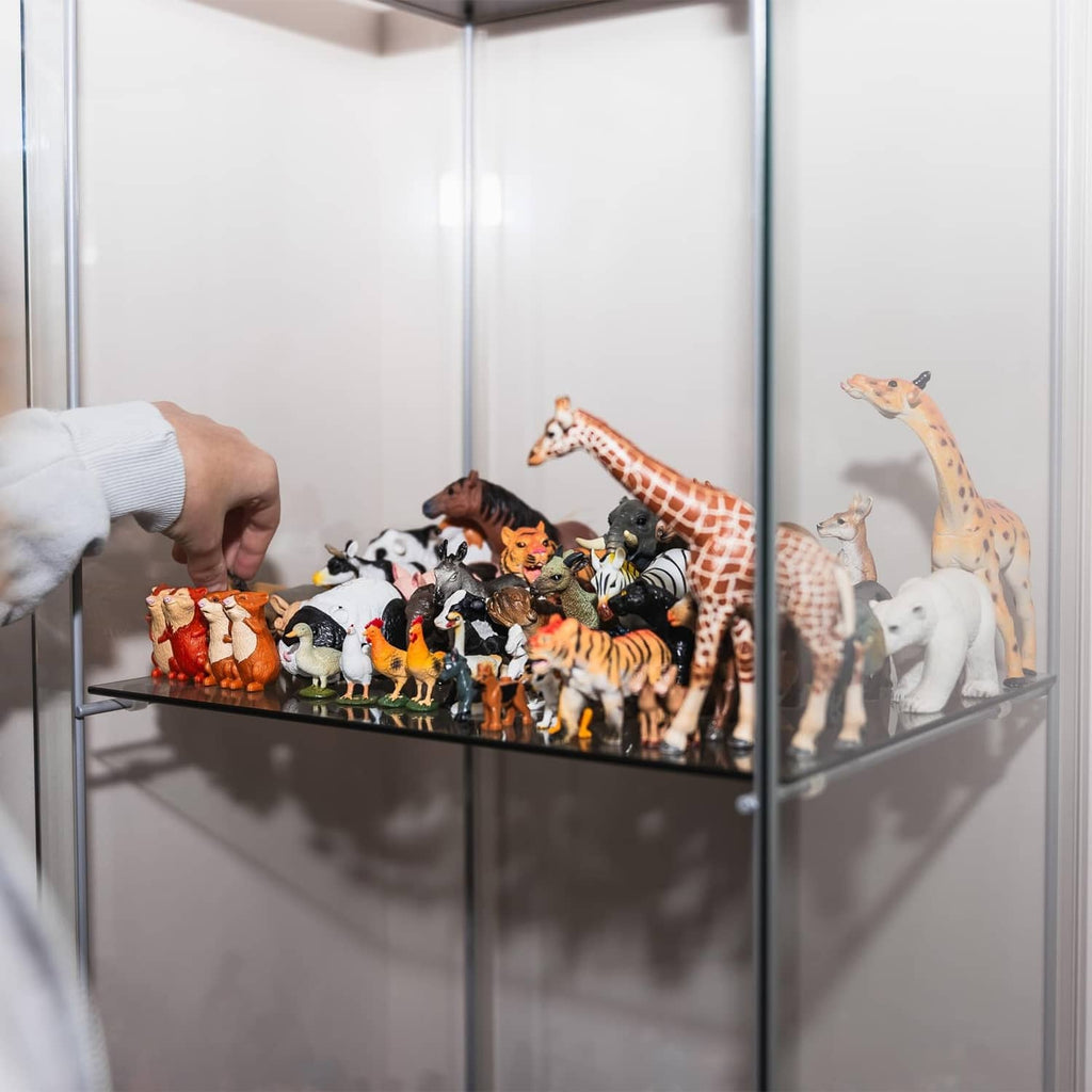 Clear acrylic display case with black base and animal figurines behind transparent walls.