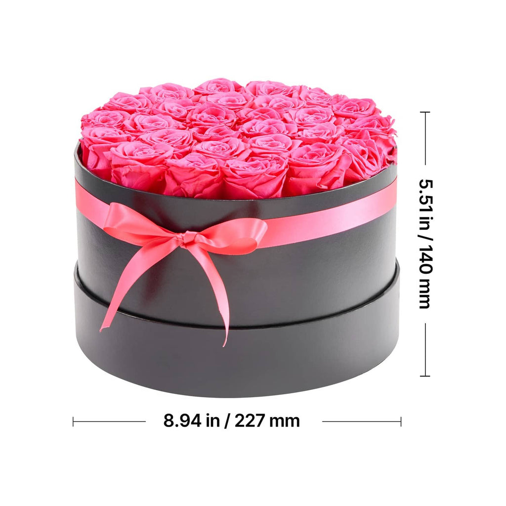 Round preserved rose bouquet in black box with pink ribbon, bright pink rose blooms