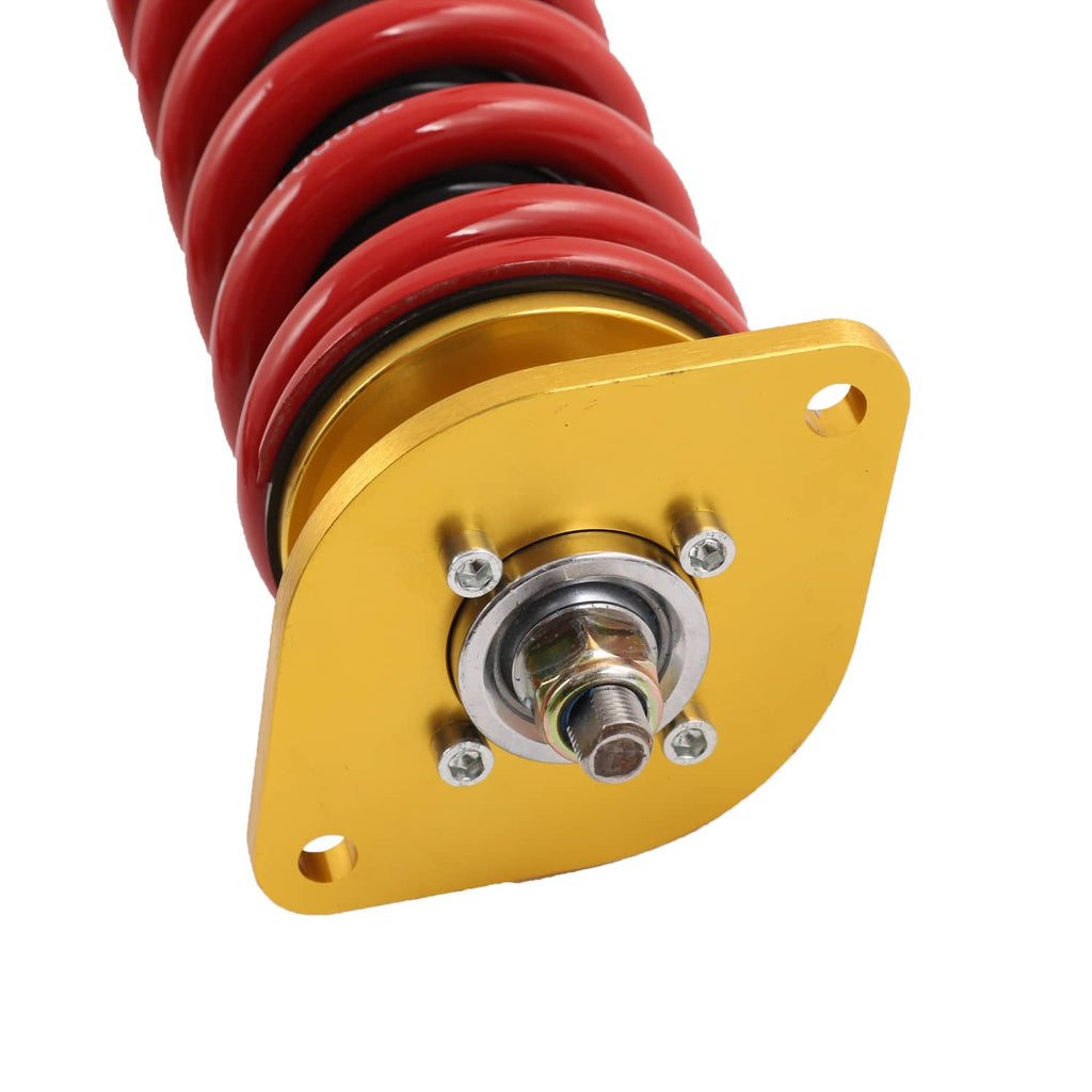 Coilover shock absorber top mount with red spring and gold plate