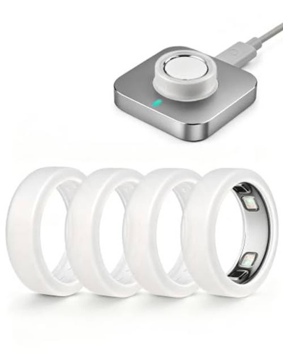 Four white soft silicone ring covers, angled view, open sensor window