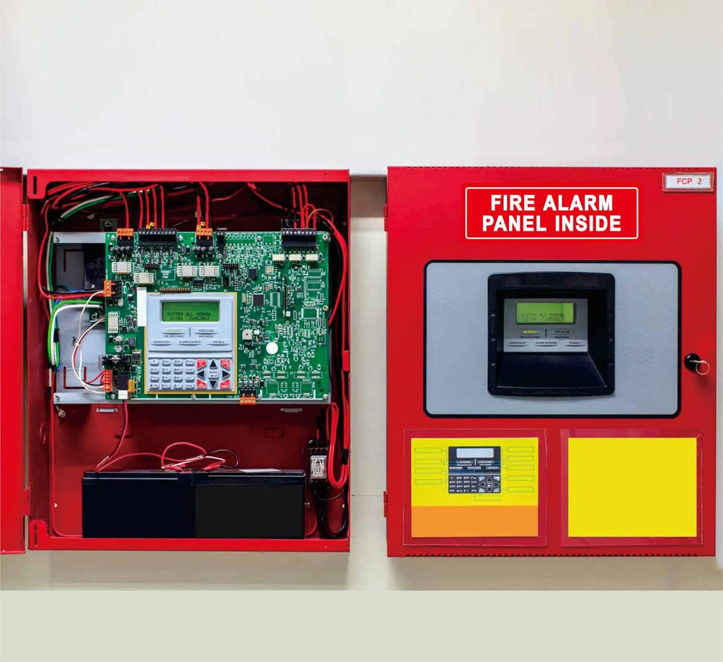 Open red fire alarm panel showing circuit board and control modules, plus label