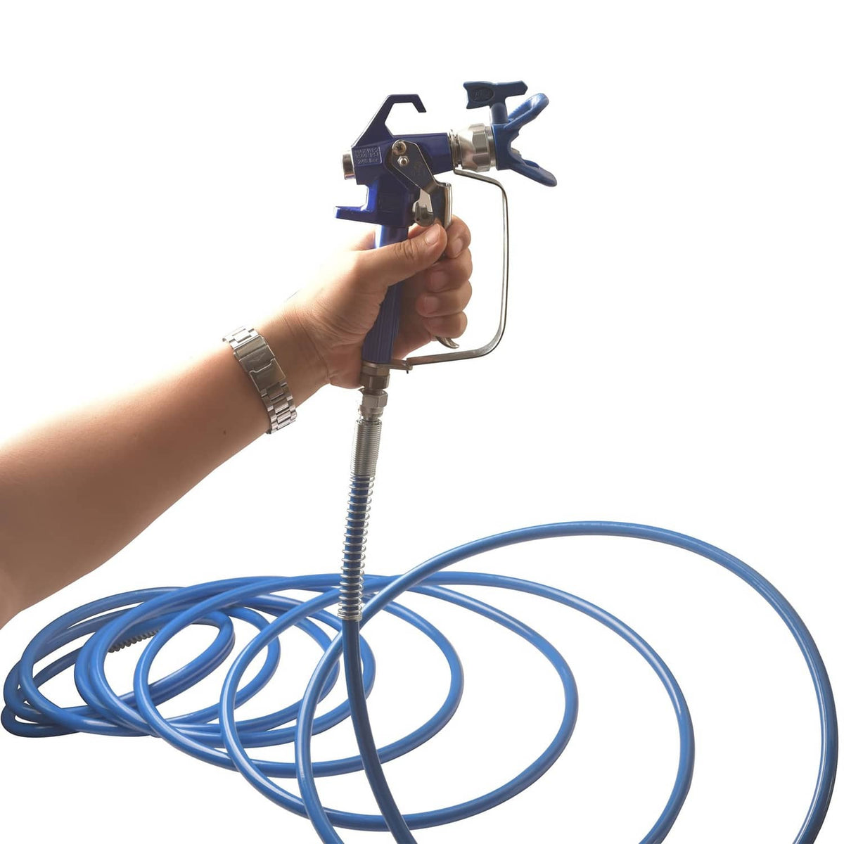 Blue braided airless spray hose coiled and connected to spray gun