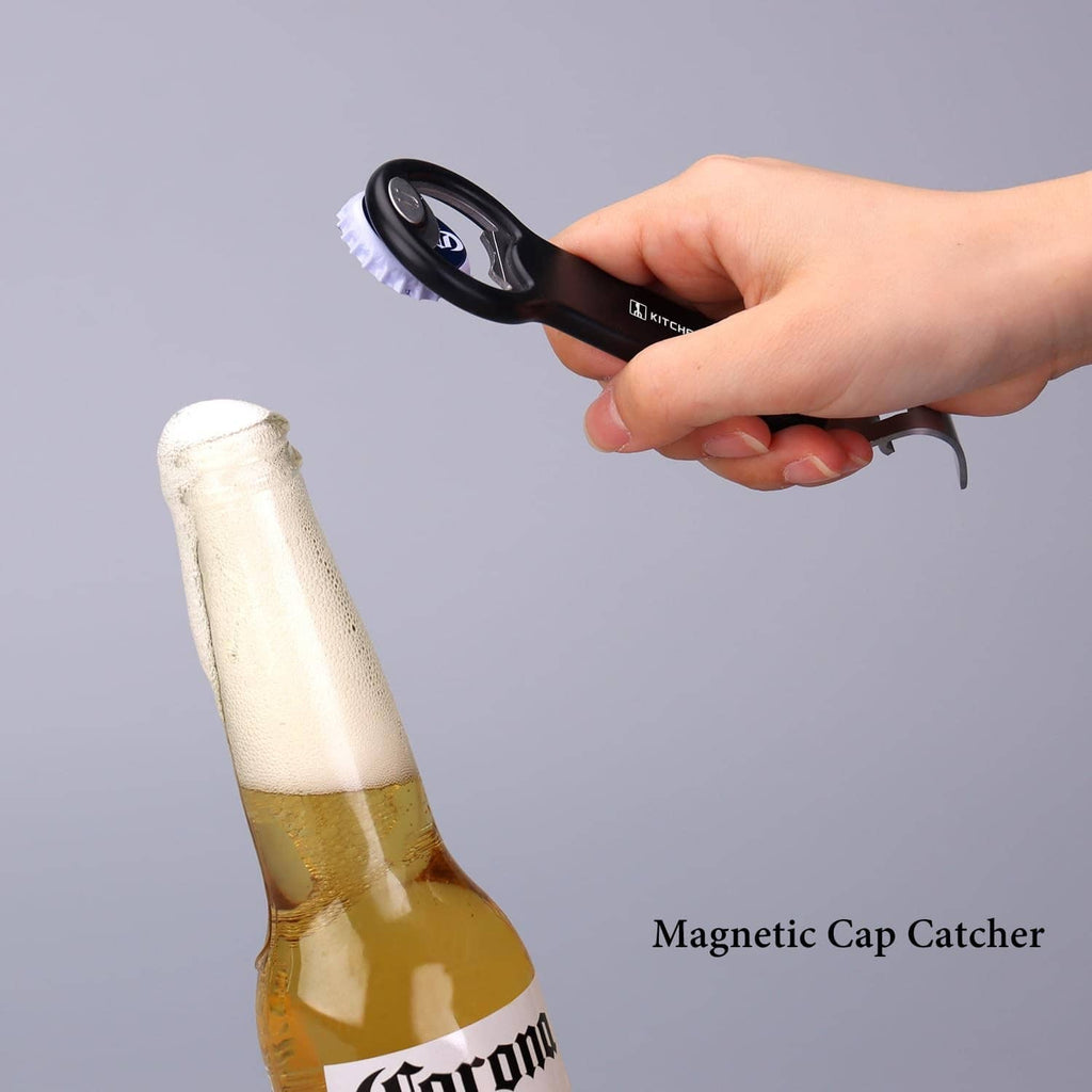 Black magnetic cap catcher opener with silver blade removing a bottle cap