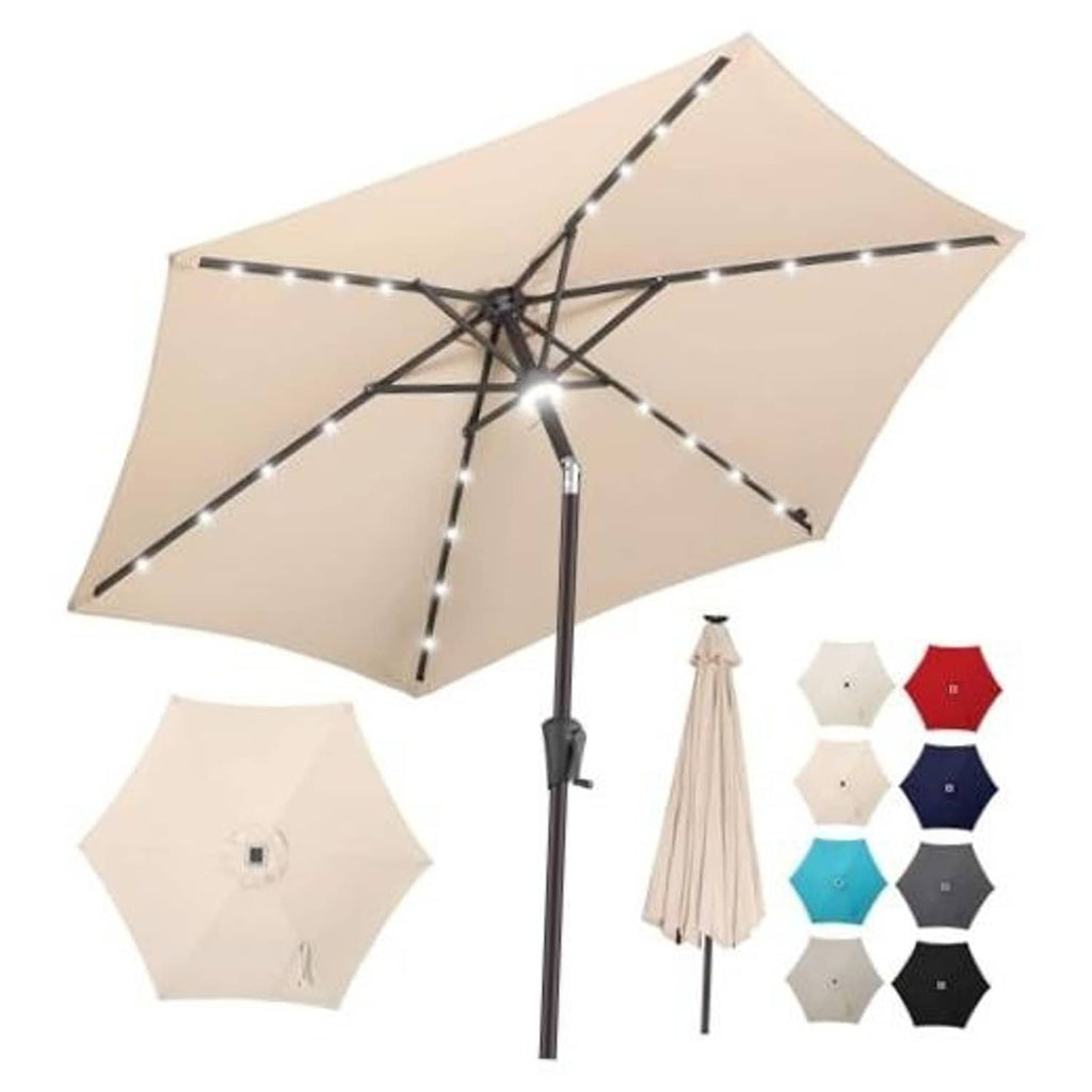 Beige patio market umbrella with center pole LED string lights and tilt support.