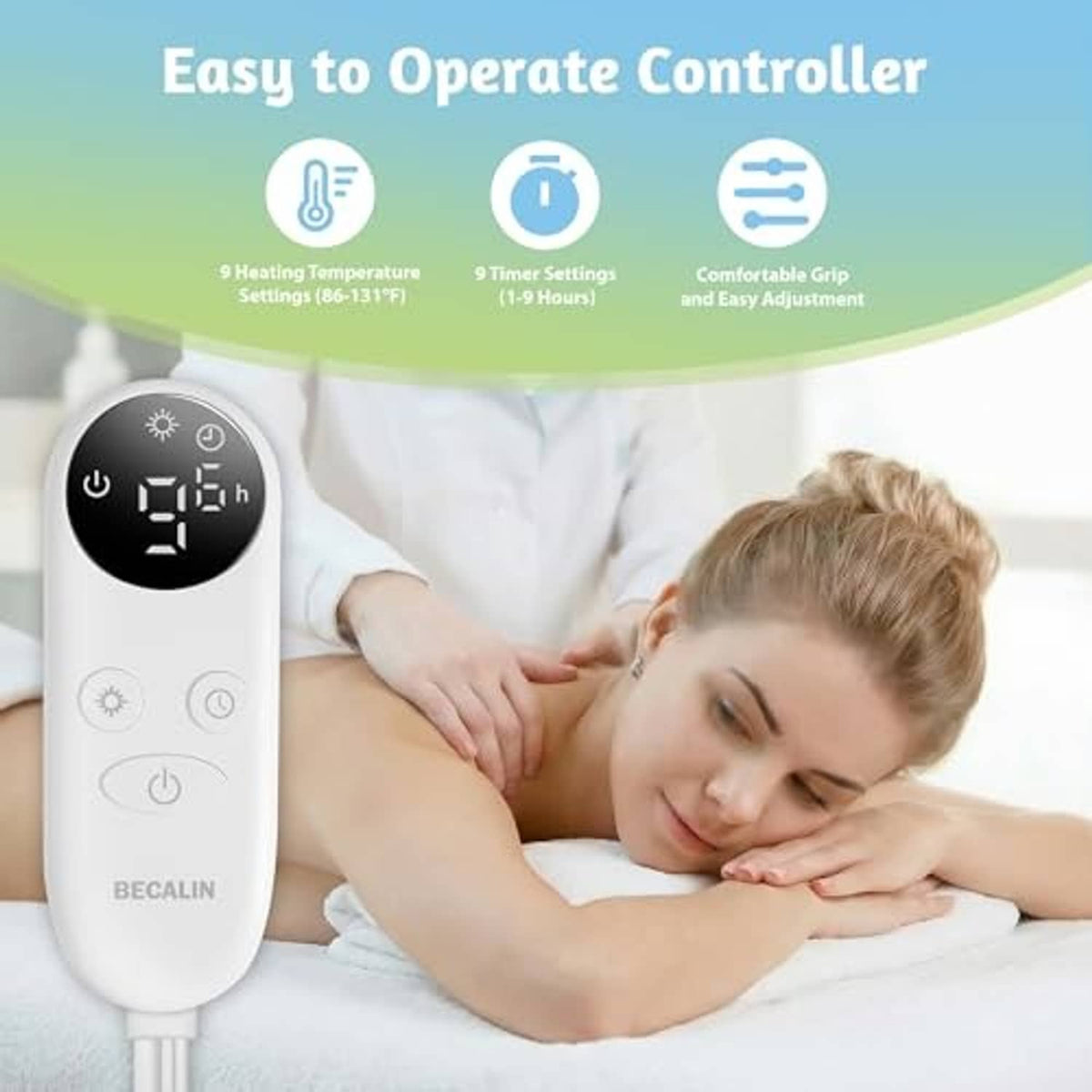 Massage table warmer controller with black display and buttons, shown on a massage bed