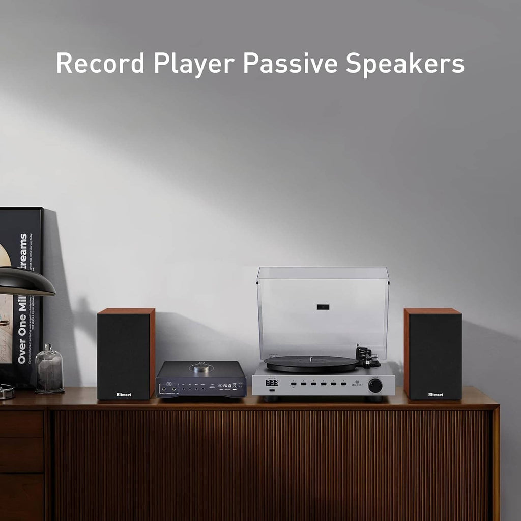 Pair of passive bookshelf speakers in wood cabinets on a media stand