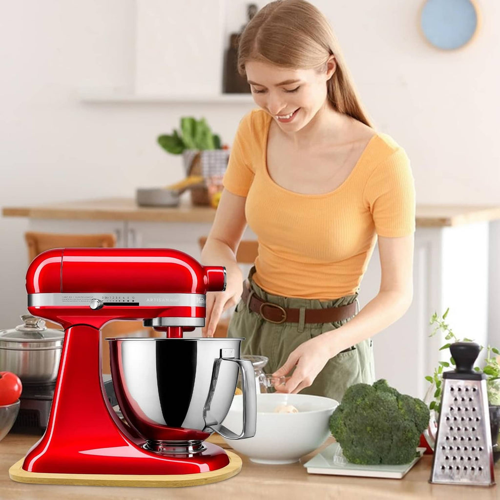Natural bamboo mixer slider pad under a red stand mixer for smoother movement