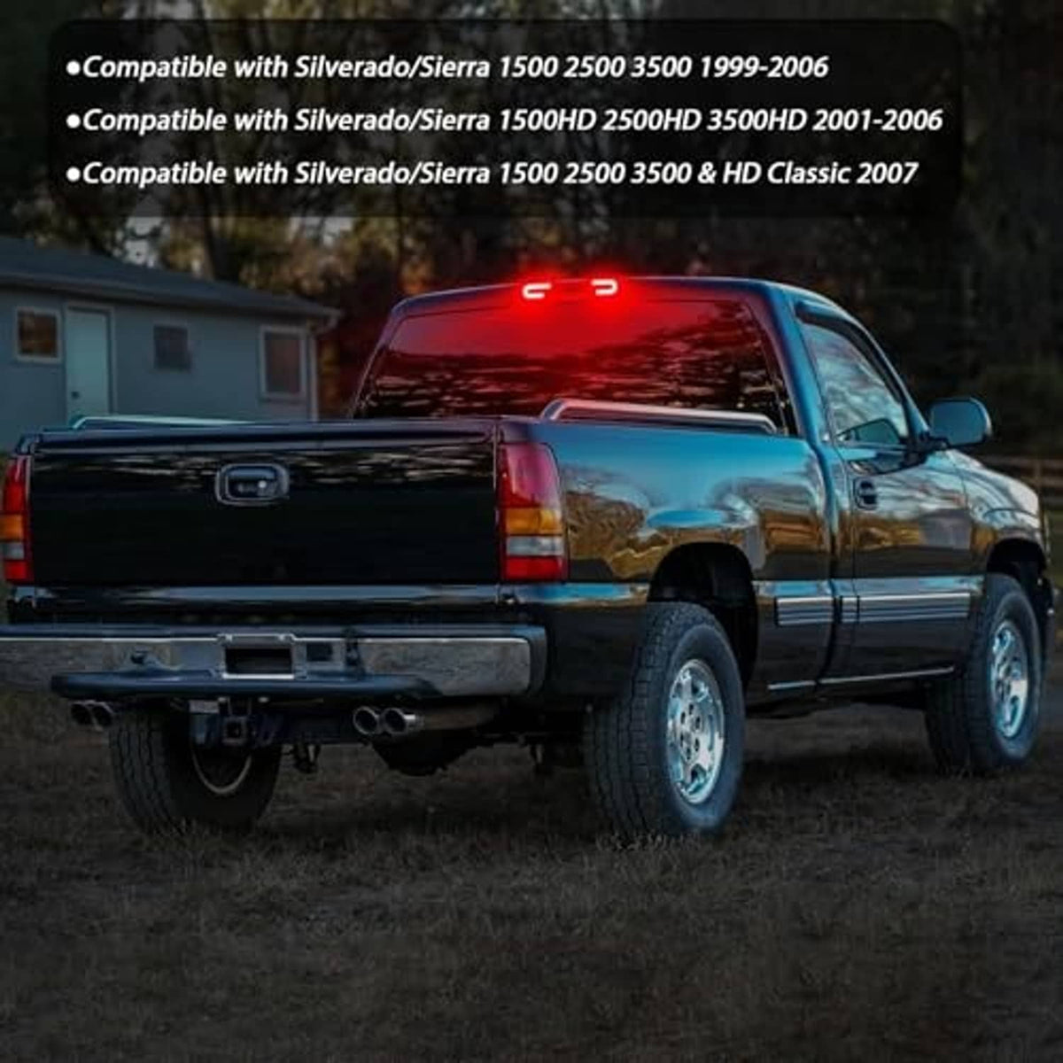 LED third brake light lit in red on a truck rear, dark smoked housing.