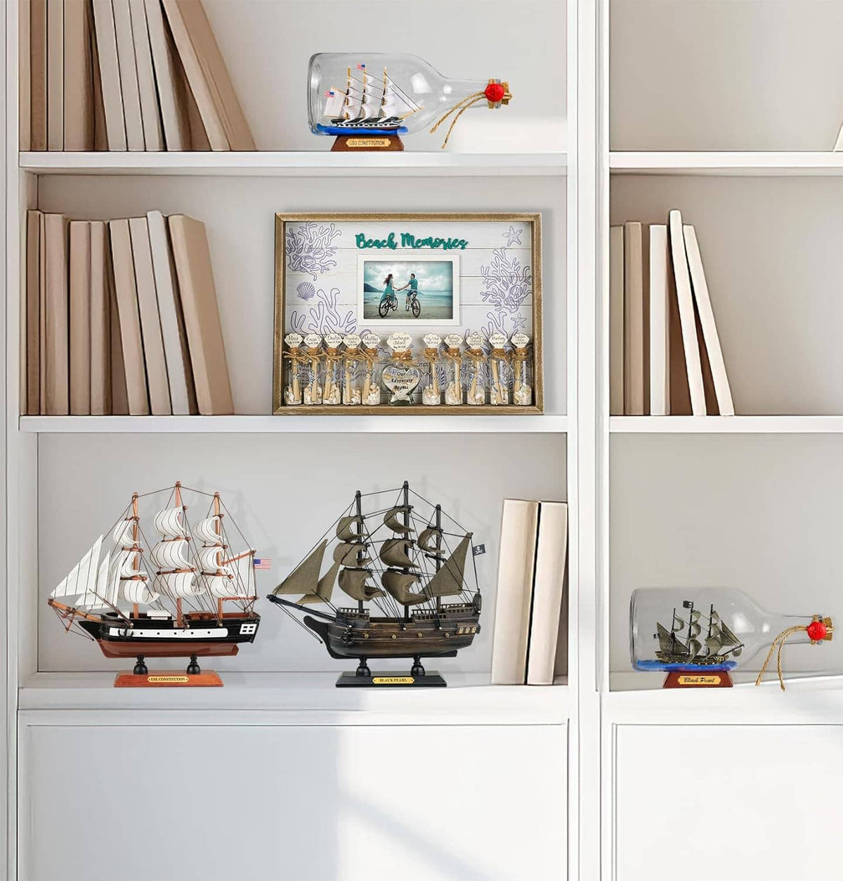 Wooden ship models displayed on shelf with miniature sailboats on stands