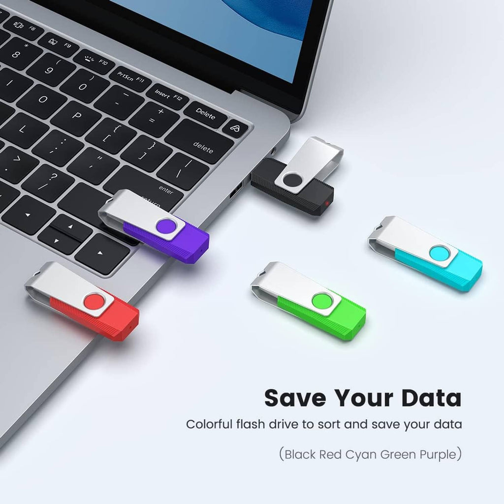 Multiple colored USB flash drives plugged into laptop; white, purple, green, red, and cyan