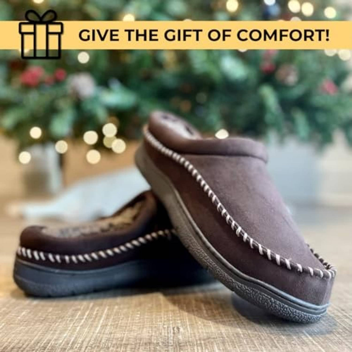 Brown suede-style clog slippers with moc-stitched edges and grippy rubber sole