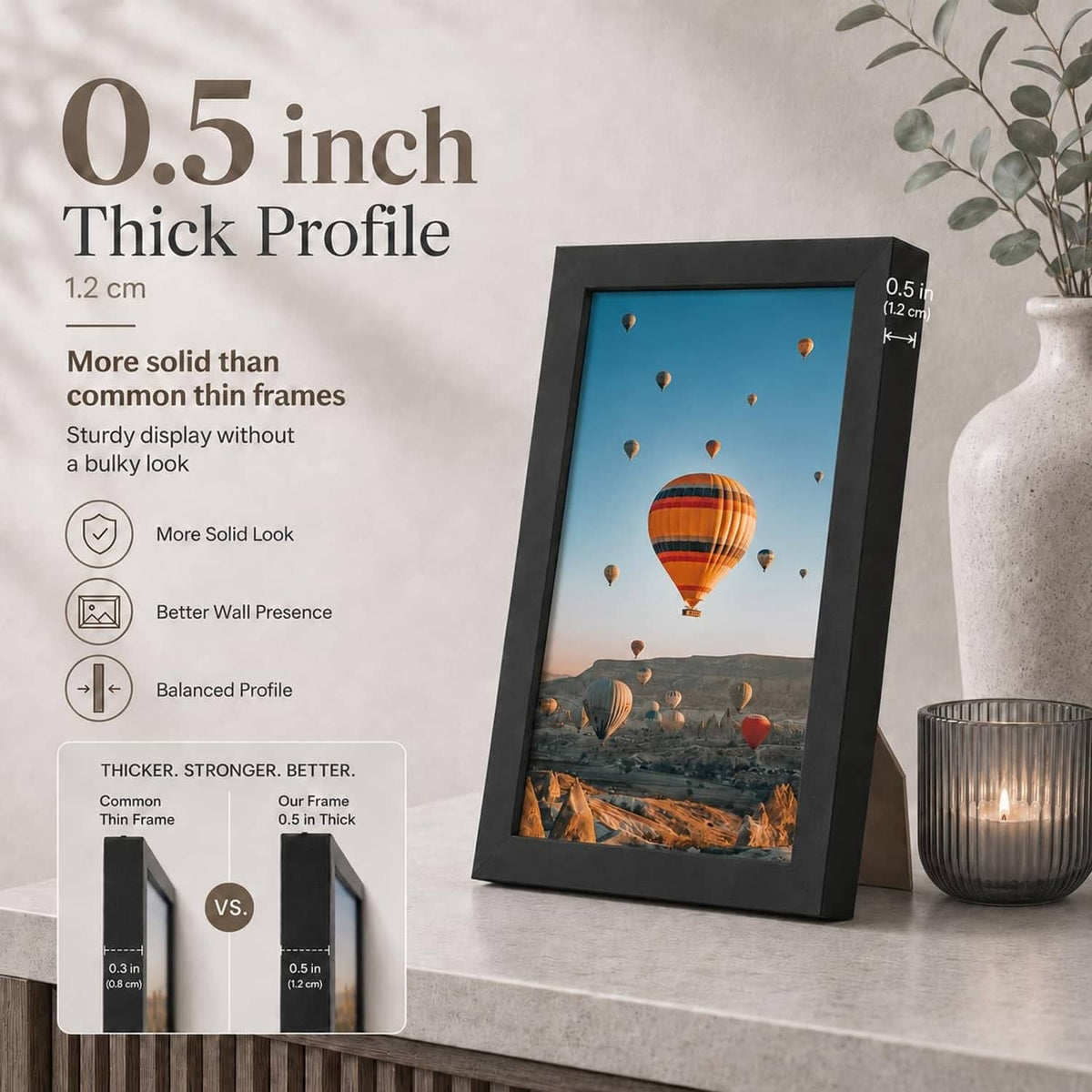 Black wall photo frame with thick profile, displaying hot air balloon artwork