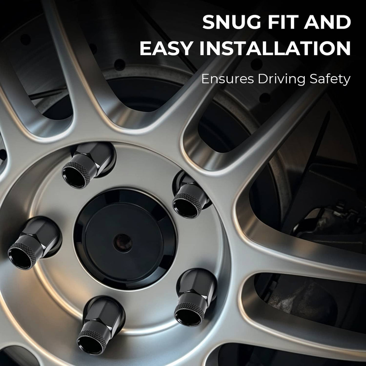 Black extended lug nuts installed on a silver alloy wheel rim