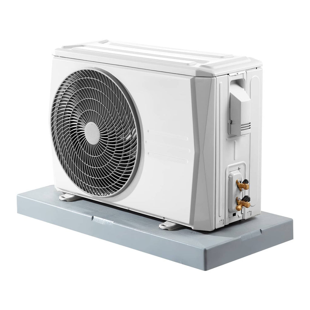 Light gray anti-vibration pad supporting a mini split outdoor unit
