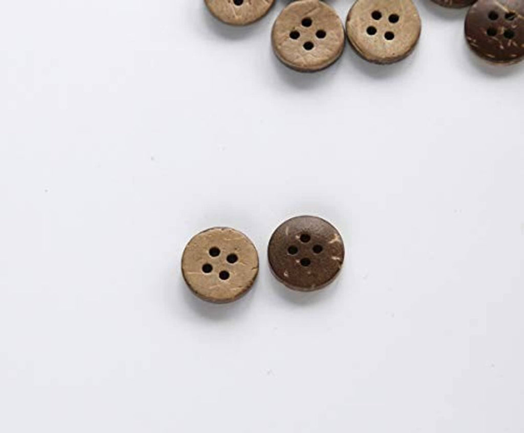 Two round coconut shell buttons, four-hole design in tan and dark brown