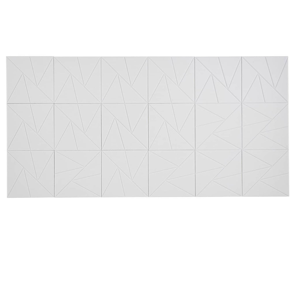 White acoustic wall panel board with repeating geometric diamond texture