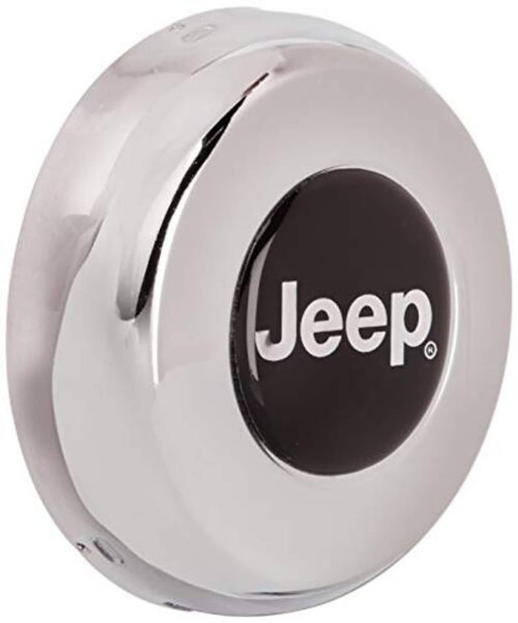 White steering wheel center cap with Jeep logo, angled view