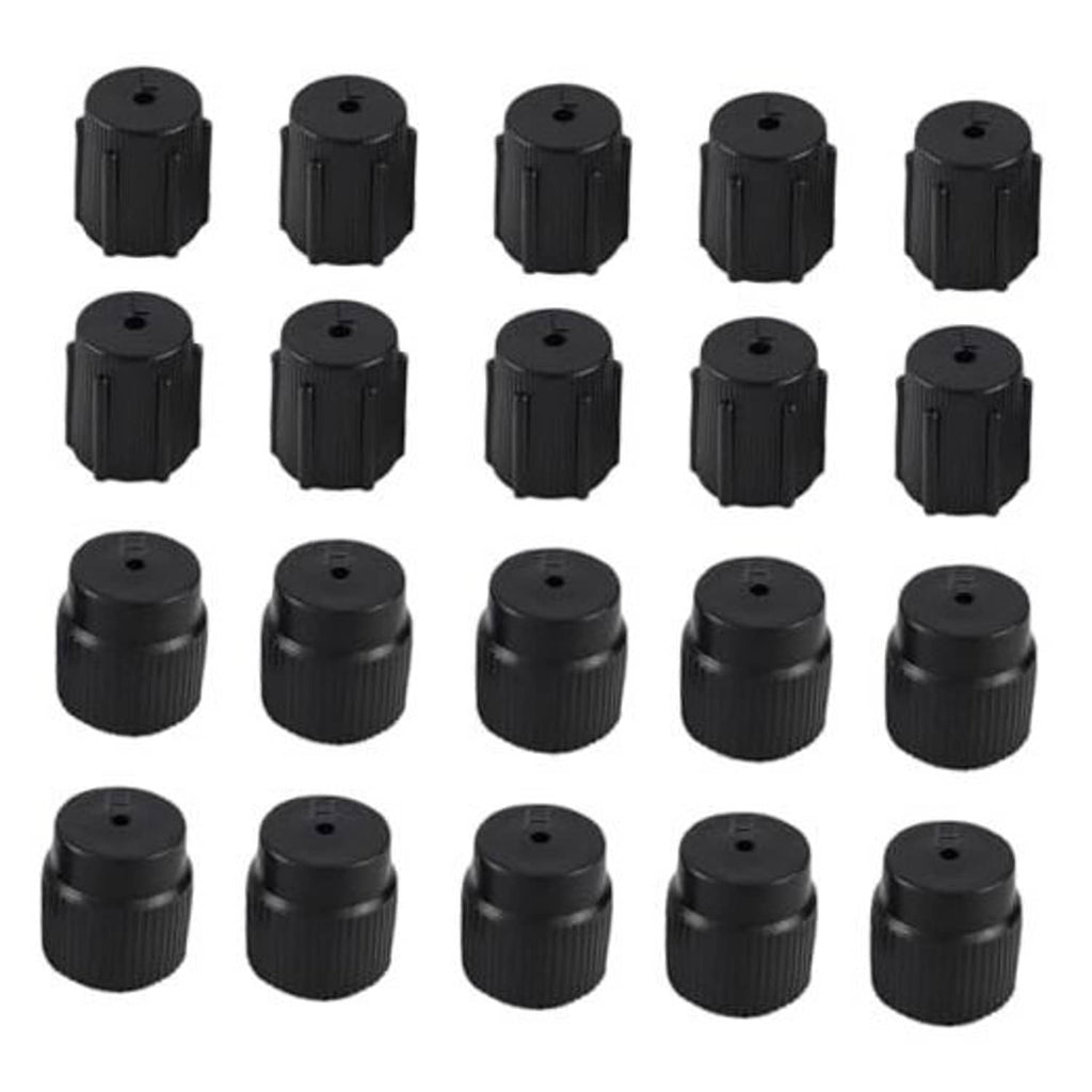 Set of black air conditioning valve cores, ridged plastic caps with central openings