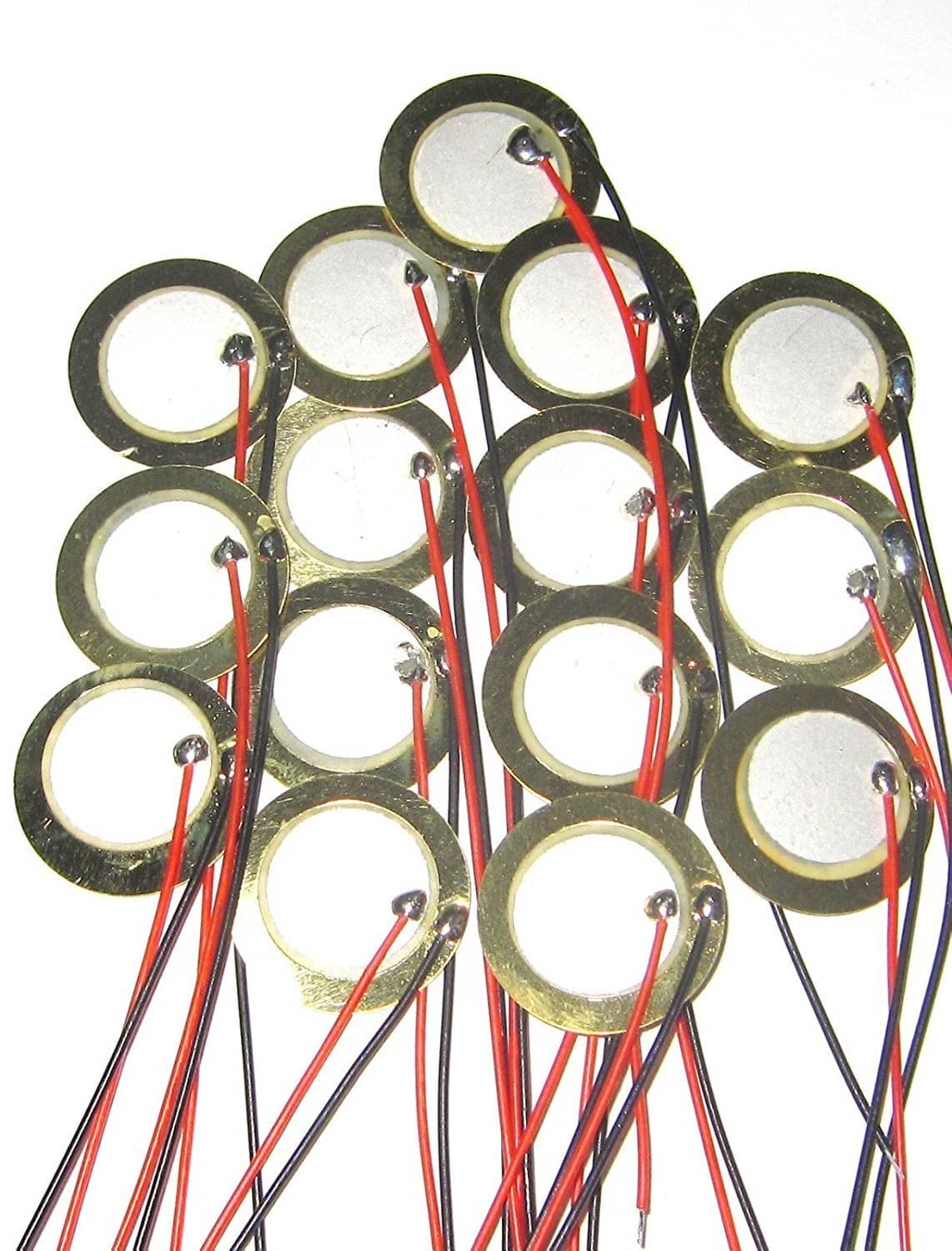 Set of 15 piezo drum trigger discs with red and black wire leads
