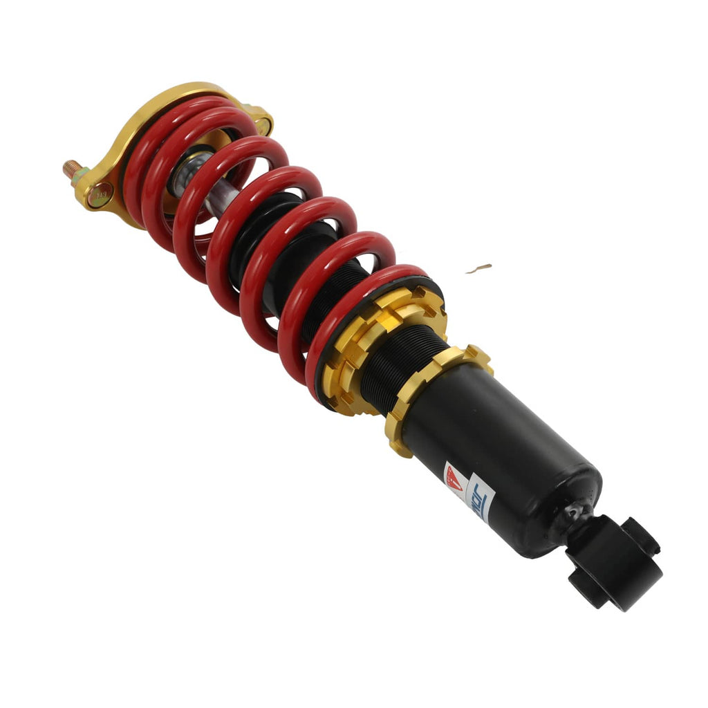 Side view of coilover strut with red spring, gold collar, black shock body, and bracket