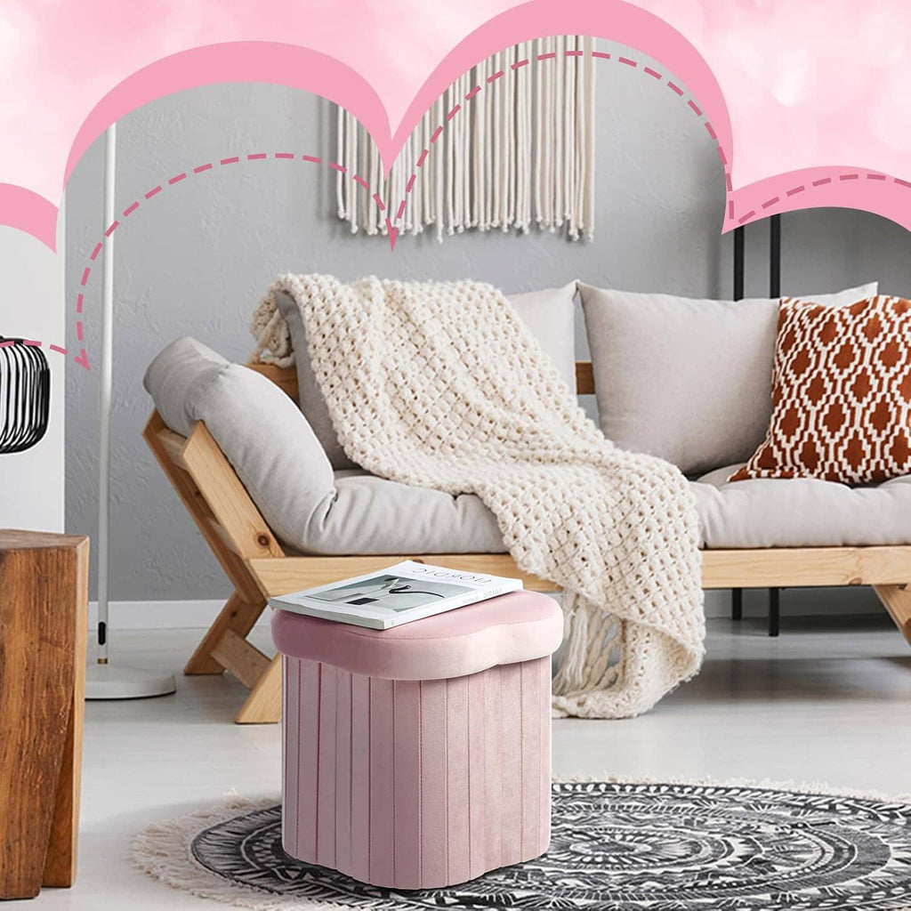 Pink velvet storage ottoman pair with padded round lids and vertical ribbed sides
