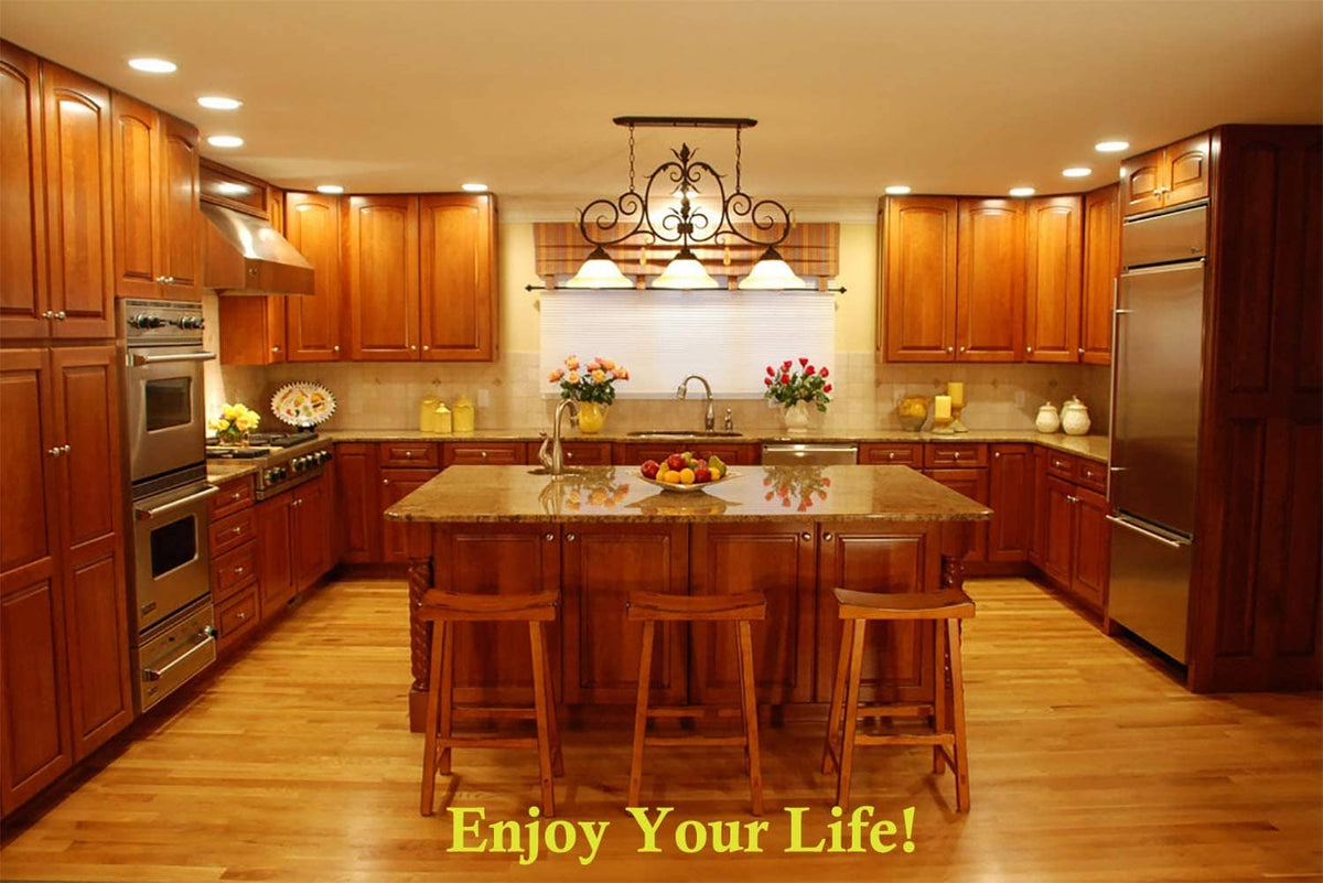 Kitchen interior with warm ceiling lighting from a dimmer-controlled light source
