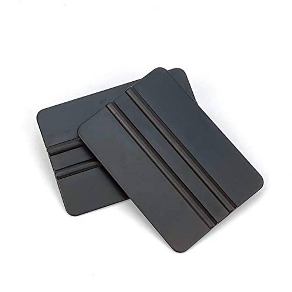 Pack of three black vinyl squeegee scrapers with ribbed rectangular blades.