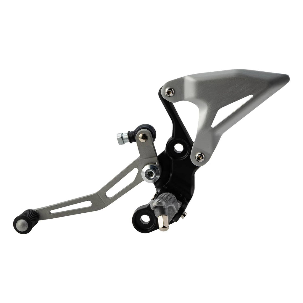 Motorcycle driver foot peg bracket with black rubber peg and silver mounting hardware