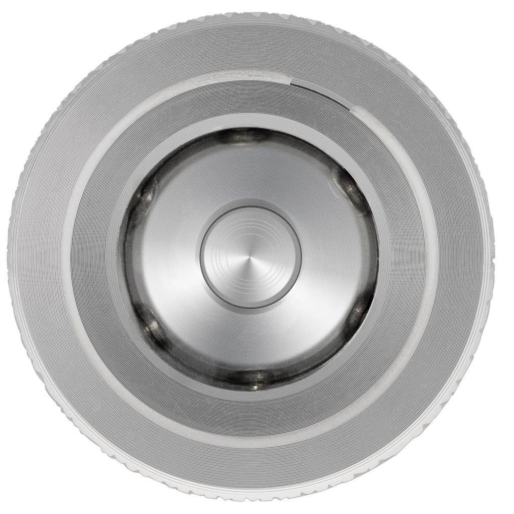 Steel quick coupler end view showing round port opening with inner recess