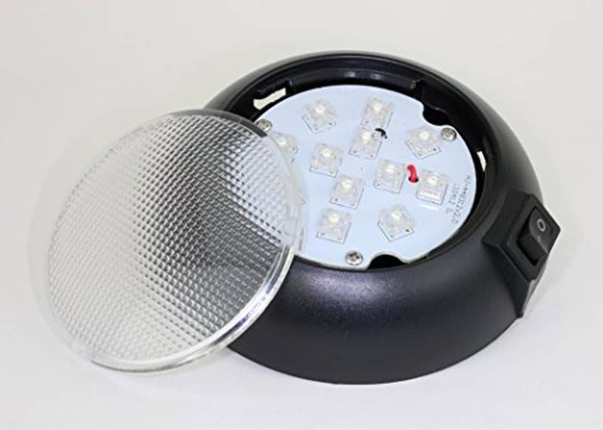 Black LED dome light with open cover showing LED circuit board inside