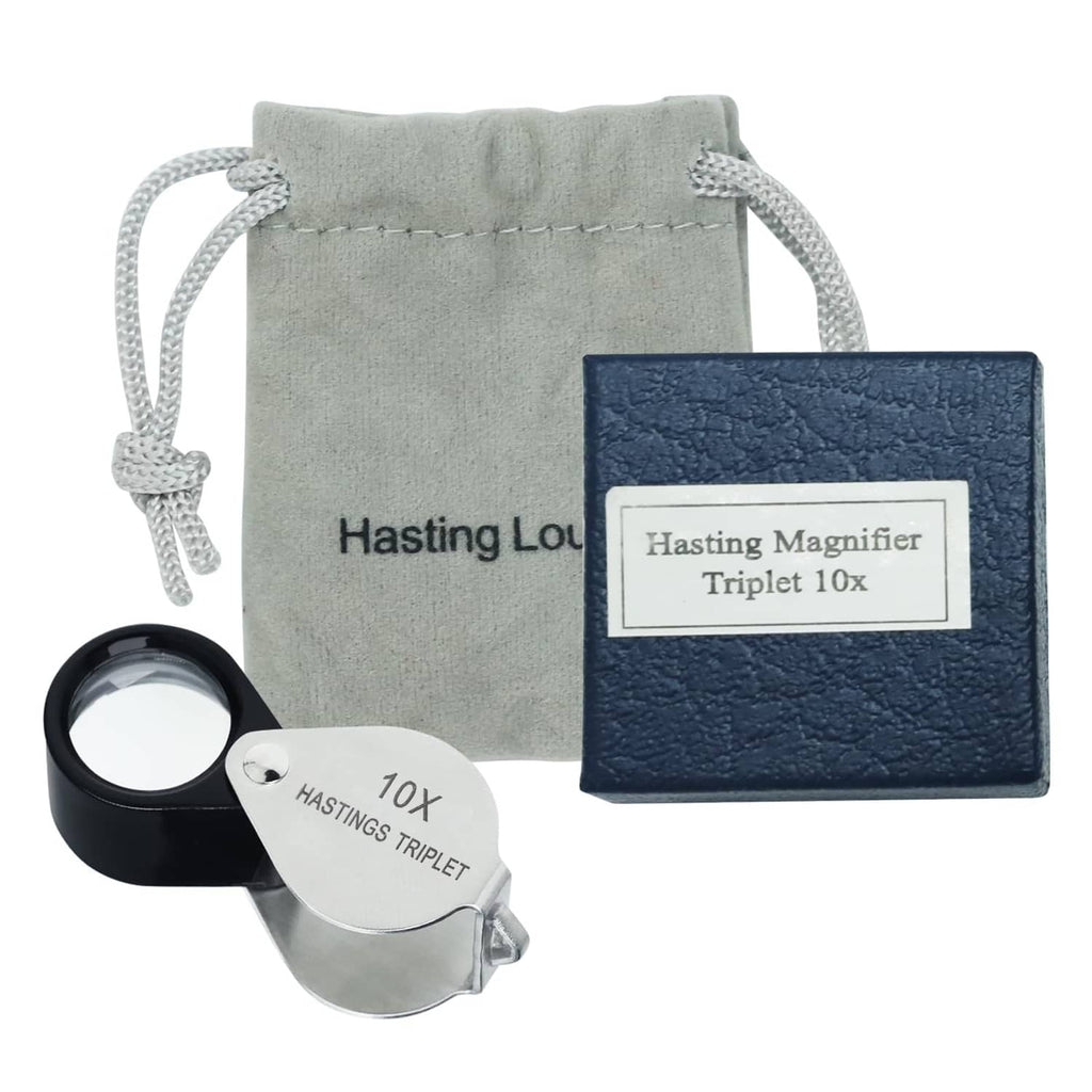 10X triplet loupe with black lens and silver body, in gray drawstring pouch