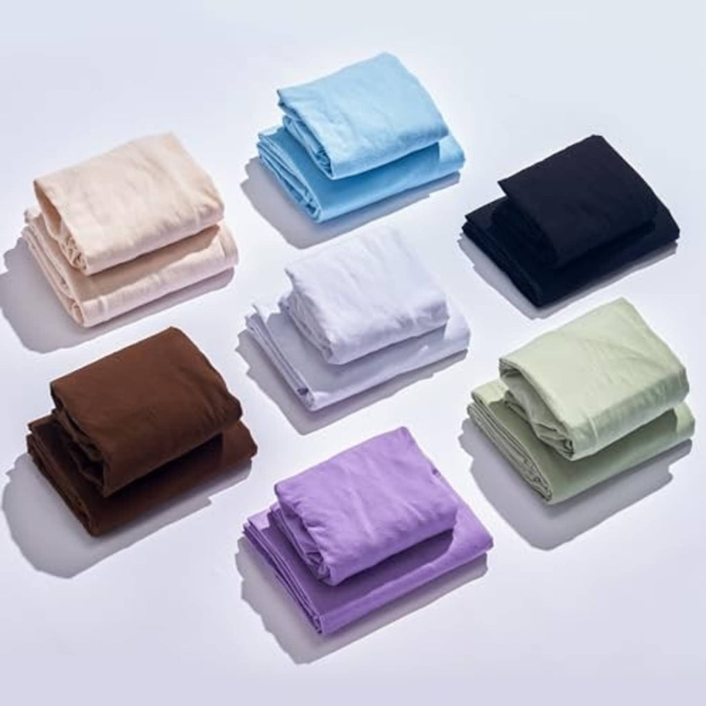 Assorted cotton flannel massage table sheet set colors: beige, blue, black, brown, white.