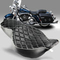 Two-up motorcycle passenger seat in black with diamond quilt stitching and white piping