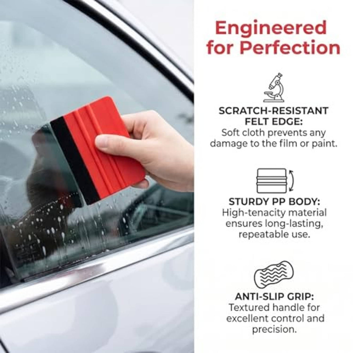 Red plastic felt-edge squeegee in hand, for smooth window or film application