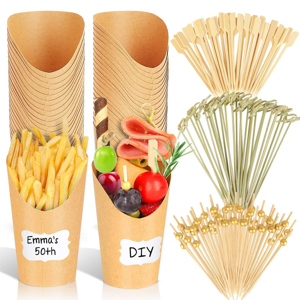 Brown kraft charcuterie cups with wooden sticks, one labeled “Emma’s 50th”