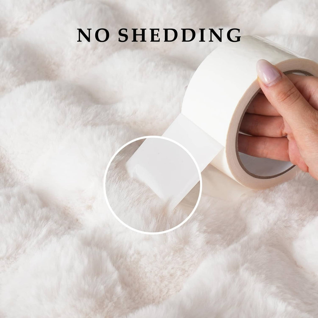 Cream faux fur throw blanket surface shown with clear tape, no shedding