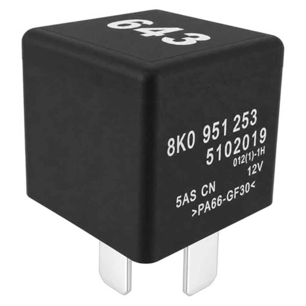 Black automotive relay cube with white printed numbers and two silver plug terminals