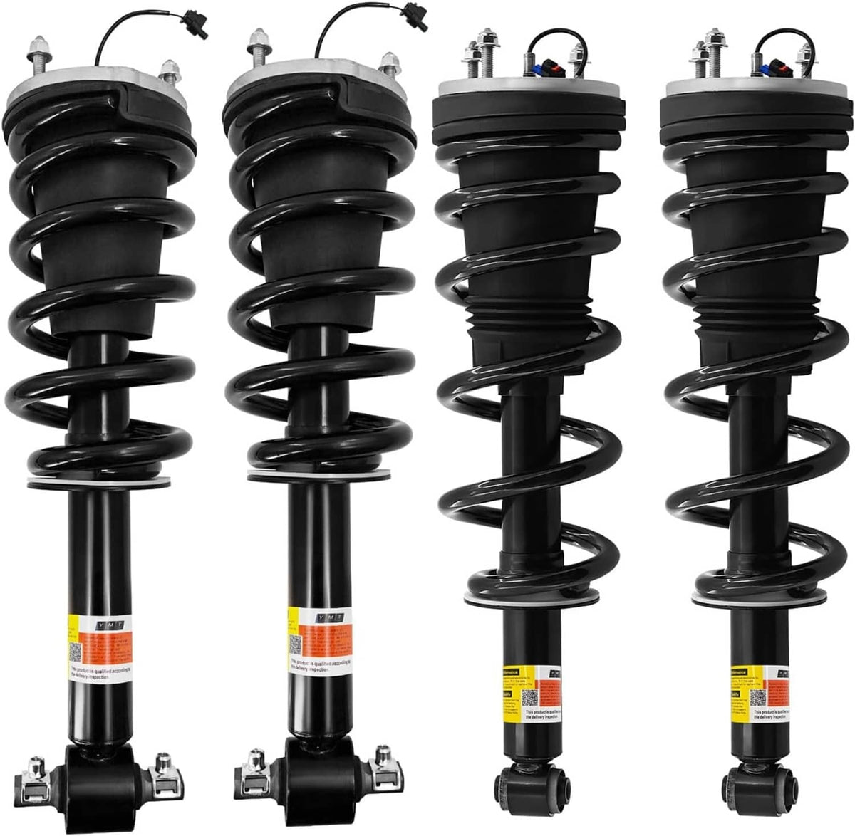 Set of four black shock absorber struts with coil springs and mounting brackets