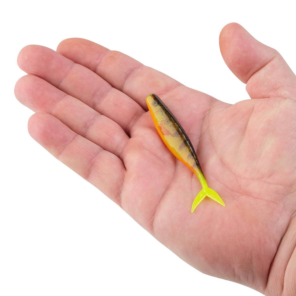 Small minnow lure in hand, orange-yellow body with chartreuse tail fin.