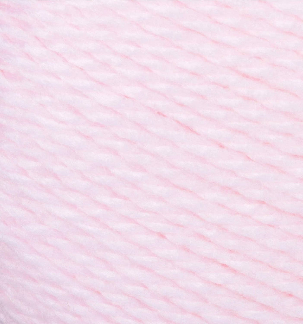 Light pink yarn texture close-up with soft, fine fibers for baby projects.